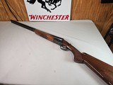 9008
Browning BSS 12 Gauge, 28” Barrels, Mod/Full, 1971 MFG, 2 Metal Beads, Early good one, Extractors, single non selective trigger, Pistol Grip, 14