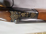 9013
SKB-Ithaca, 280, 20 Gauge, SXS, 25” barrels, Mod/Imp, straight grip, Ithaca-SKB butt plate, Gold Accent, in scroll work, single gold trigger, 97 - 5 of 23