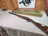 9013
SKB-Ithaca, 280, 20 Gauge, SXS, 25” barrels, Mod/Imp, straight grip, Ithaca-SKB butt plate, Gold Accent, in scroll work, single gold trigger, 97 - 1 of 23