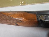 9013
SKB-Ithaca, 280, 20 Gauge, SXS, 25” barrels, Mod/Imp, straight grip, Ithaca-SKB butt plate, Gold Accent, in scroll work, single gold trigger, 97 - 7 of 23