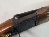 9015
SKB-Ithaca 280 Classic 12 Gauge SXS, 2 3/4, 26” Barrels, straight stock, SKB/Ithaca butt plate, 99% LNIB, 14 1/4 LOP, Single gold trigger, MOD/ - 18 of 25