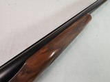 9015
SKB-Ithaca 280 Classic 12 Gauge SXS, 2 3/4, 26” Barrels, straight stock, SKB/Ithaca butt plate, 99% LNIB, 14 1/4 LOP, Single gold trigger, MOD/ - 16 of 25