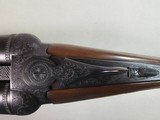 9015
SKB-Ithaca 280 Classic 12 Gauge SXS, 2 3/4, 26” Barrels, straight stock, SKB/Ithaca butt plate, 99% LNIB, 14 1/4 LOP, Single gold trigger, MOD/ - 13 of 25