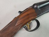 9015
SKB-Ithaca 280 Classic 12 Gauge SXS, 2 3/4, 26” Barrels, straight stock, SKB/Ithaca butt plate, 99% LNIB, 14 1/4 LOP, Single gold trigger, MOD/ - 19 of 25