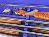 9017 Winchester 101
3 barrel skeet set, 20 gauge, 28 gauge, 410 gauge, pistol grip, vent rib, 13 1/2 LOP, 28” barrels, In correct case, 97%, great sk - 4 of 25