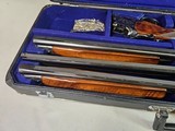 9017 Winchester 101
3 barrel skeet set, 20 gauge, 28 gauge, 410 gauge, pistol grip, vent rib, 13 1/2 LOP, 28” barrels, In correct case, 97%, great sk - 5 of 25