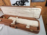 9027
Browning Hartmann shotgun case, It has the keys with it. Great condition case in and out! Up to a 30