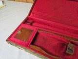 9026
Winchester Green Shotgun trunk style case. Has the red interior and comes with keys. Up to a 26” barrel.
Great case. More pictures at dawsonsdo - 9 of 13