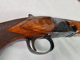 9030
Winchester 101 Field, 20 Gauge, 2 3/4 and 3” , Mod/Full, 28” barrels, single selective trigger, ejectors, Red W on the pistol grip, 1st three ye - 18 of 23