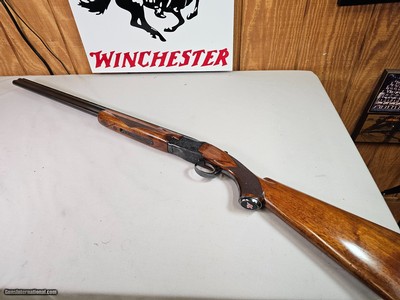 9030
Winchester 101 Field, 20 Gauge, 2 3/4 and 3” , Mod/Full, 28” barrels, single selective trigger, ejectors, Red W on the pistol grip, 1st three ye