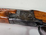 9030
Winchester 101 Field, 20 Gauge, 2 3/4 and 3” , Mod/Full, 28” barrels, single selective trigger, ejectors, Red W on the pistol grip, 1st three ye - 6 of 23