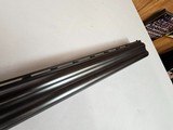9030
Winchester 101 Field, 20 Gauge, 2 3/4 and 3” , Mod/Full, 28” barrels, single selective trigger, ejectors, Red W on the pistol grip, 1st three ye - 23 of 23