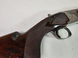 9029
Winchester 101 Pigeon Grade, 20 Gauge, 26” barrels, 2 3/4 and 3”, Early good one, with dark tiger stripped walnut, round knob, 98%, butt plate, - 20 of 21