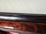 9038
Winchester 101 Pigeon 20 Gauge. Pistol Grip, 2 3/4 and 3”, Vent Rib, 28” Barrels, Full/MOD, Ejectors, LOP 14 1/4, Winchester butt plate, 96-97% - 14 of 25