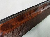 9038
Winchester 101 Pigeon 20 Gauge. Pistol Grip, 2 3/4 and 3”, Vent Rib, 28” Barrels, Full/MOD, Ejectors, LOP 14 1/4, Winchester butt plate, 96-97% - 22 of 25