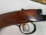 9035
Winchester 23 Classic SXS, 410 Gauge 2 1/2 and 3”, 26” vent rib barrels, MOD/FULL, Gold quail on bottom and a gold trigger, Butt pad, Single sel - 15 of 25