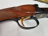 9035
Winchester 23 Classic SXS, 410 Gauge 2 1/2 and 3”, 26” vent rib barrels, MOD/FULL, Gold quail on bottom and a gold trigger, Butt pad, Single sel - 13 of 25