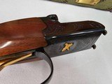 9035
Winchester 23 Classic SXS, 410 Gauge 2 1/2 and 3”, 26” vent rib barrels, MOD/FULL, Gold quail on bottom and a gold trigger, Butt pad, Single sel - 14 of 25