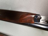 9035
Winchester 23 Classic SXS, 410 Gauge 2 1/2 and 3”, 26” vent rib barrels, MOD/FULL, Gold quail on bottom and a gold trigger, Butt pad, Single sel - 21 of 25