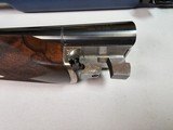 9040
Beretta Model 471
Silver Hawk SXS shotgun, 12 Gauge, 2 3/4, 26” Barrels, 5 choke tubes, silver finish, box lock, single selective trigger, sele - 19 of 24