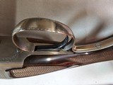 9037
Winchester 101 Pigeon Grade, 20 Gauge, 2 3/4, 26” vent rib barrels, IC/MOD, 14 1/4 LOP, Round Knob, Butt plate, Beautiful dark walnut, 99%, Corr - 14 of 25