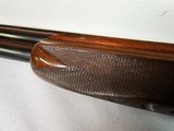 9037
Winchester 101 Pigeon Grade, 20 Gauge, 2 3/4, 26” vent rib barrels, IC/MOD, 14 1/4 LOP, Round Knob, Butt plate, Beautiful dark walnut, 99%, Corr - 23 of 25