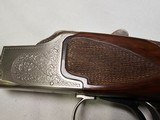 9037
Winchester 101 Pigeon Grade, 20 Gauge, 2 3/4, 26” vent rib barrels, IC/MOD, 14 1/4 LOP, Round Knob, Butt plate, Beautiful dark walnut, 99%, Corr - 9 of 25