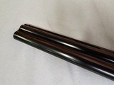 9037
Winchester 101 Pigeon Grade, 20 Gauge, 2 3/4, 26” vent rib barrels, IC/MOD, 14 1/4 LOP, Round Knob, Butt plate, Beautiful dark walnut, 99%, Corr - 25 of 25