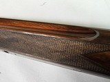9037
Winchester 101 Pigeon Grade, 20 Gauge, 2 3/4, 26” vent rib barrels, IC/MOD, 14 1/4 LOP, Round Knob, Butt plate, Beautiful dark walnut, 99%, Corr - 22 of 25