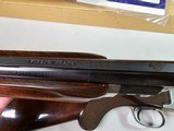 9037
Winchester 101 Pigeon Grade, 20 Gauge, 2 3/4, 26” vent rib barrels, IC/MOD, 14 1/4 LOP, Round Knob, Butt plate, Beautiful dark walnut, 99%, Corr - 20 of 25