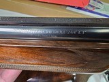 9037
Winchester 101 Pigeon Grade, 20 Gauge, 2 3/4, 26” vent rib barrels, IC/MOD, 14 1/4 LOP, Round Knob, Butt plate, Beautiful dark walnut, 99%, Corr - 19 of 25