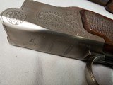 9037
Winchester 101 Pigeon Grade, 20 Gauge, 2 3/4, 26” vent rib barrels, IC/MOD, 14 1/4 LOP, Round Knob, Butt plate, Beautiful dark walnut, 99%, Corr - 8 of 25