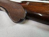 9037
Winchester 101 Pigeon Grade, 20 Gauge, 2 3/4, 26” vent rib barrels, IC/MOD, 14 1/4 LOP, Round Knob, Butt plate, Beautiful dark walnut, 99%, Corr - 5 of 25