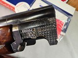 9039
Winchester 101 Pigeon Grade, 12 Gauge, 2 3/4, 28” vent rib barrels, MOD/Full, 14 1/4 LOP, Round Knob, Butt plate, Beautiful dark walnut, 99%, Co - 24 of 25
