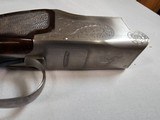 9039
Winchester 101 Pigeon Grade, 12 Gauge, 2 3/4, 28” vent rib barrels, MOD/Full, 14 1/4 LOP, Round Knob, Butt plate, Beautiful dark walnut, 99%, Co - 9 of 25