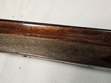 9039
Winchester 101 Pigeon Grade, 12 Gauge, 2 3/4, 28” vent rib barrels, MOD/Full, 14 1/4 LOP, Round Knob, Butt plate, Beautiful dark walnut, 99%, Co - 20 of 25