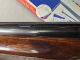9039
Winchester 101 Pigeon Grade, 12 Gauge, 2 3/4, 28” vent rib barrels, MOD/Full, 14 1/4 LOP, Round Knob, Butt plate, Beautiful dark walnut, 99%, Co - 23 of 25