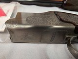 9039
Winchester 101 Pigeon Grade, 12 Gauge, 2 3/4, 28” vent rib barrels, MOD/Full, 14 1/4 LOP, Round Knob, Butt plate, Beautiful dark walnut, 99%, Co - 8 of 25