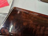 9039
Winchester 101 Pigeon Grade, 12 Gauge, 2 3/4, 28” vent rib barrels, MOD/Full, 14 1/4 LOP, Round Knob, Butt plate, Beautiful dark walnut, 99%, Co - 14 of 25