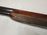 9039
Winchester 101 Pigeon Grade, 12 Gauge, 2 3/4, 28” vent rib barrels, MOD/Full, 14 1/4 LOP, Round Knob, Butt plate, Beautiful dark walnut, 99%, Co - 21 of 25