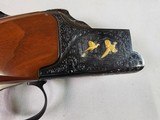9036
Winchester Grand European Presentation Grade, Pistol Grip, Single selective trigger, 12 Gauge, SK/SK, 27” barrels, Ejectors, AA++ Walnut, 14 1/4 - 11 of 25