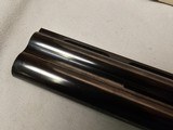9036
Winchester Grand European Presentation Grade, Pistol Grip, Single selective trigger, 12 Gauge, SK/SK, 27” barrels, Ejectors, AA++ Walnut, 14 1/4 - 21 of 25