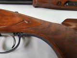 9036
Winchester Grand European Presentation Grade, Pistol Grip, Single selective trigger, 12 Gauge, SK/SK, 27” barrels, Ejectors, AA++ Walnut, 14 1/4 - 6 of 25