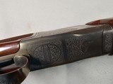 9043
Winchester 101 XTR Pigeon Grade, 12 Gauge, WInchoke (MOD/MOD), 28” Vented barrels, Butt pad, Round Knob, 14 1/4 LOP, in original box with all pa - 24 of 25
