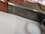 9043
Winchester 101 XTR Pigeon Grade, 12 Gauge, WInchoke (MOD/MOD), 28” Vented barrels, Butt pad, Round Knob, 14 1/4 LOP, in original box with all pa - 9 of 25