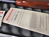9046
Winchester Model 12 Pump Duck Unlimited, 20 Gauge, Limited Edition, 93-94 Gun of the year, 26” IC Rib barrel, 2 3/4, Beautiful 2/3 American Waln - 21 of 25