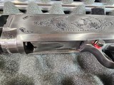 9046
Winchester Model 12 Pump Duck Unlimited, 20 Gauge, Limited Edition, 93-94 Gun of the year, 26” IC Rib barrel, 2 3/4, Beautiful 2/3 American Waln - 16 of 25