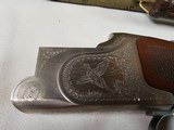 9047
Winchester 101 Pigeon XTR Lightweight, 12 Gauge, 3”, Winchoke, Full/Mod, Round knob, Butt Pad, Vent rib, ejectors, 27” barrels, 14 1/4 LOP. In a - 8 of 25