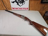 9049
Winchester Model 23 Pigeon Grade XTR, 12 Gauge, Round Knob, Ejectors, Butt plate, 13 1/2 LOP, 28 vent rib barrels, Mod/Full, great shotgun, 98-9