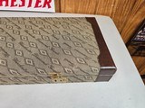 9053 Winchester Diamond Grade hard trunk style case. VERY rare as it will hold up to
34” barrel. Not many in this size. Has the original keys as well - 2 of 18